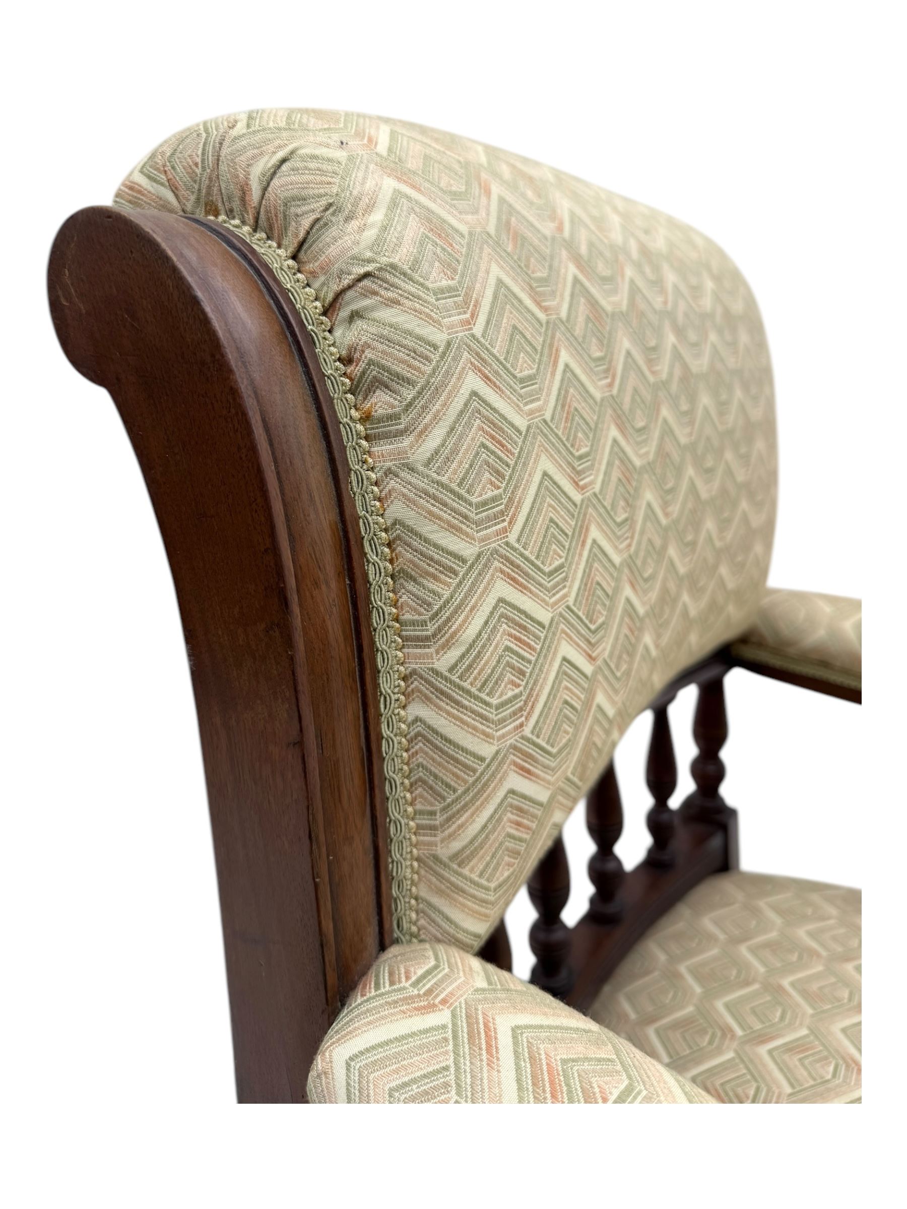 Late Victorian mahogany framed armchair, scroll back with spindle gallery, upholstered seat back and arms