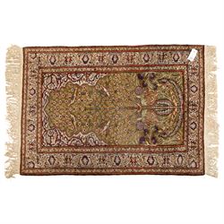 Afghan Ziegler rug, terracotta field with an all-over design of palmettes and stylized foliage in soft beige and gold tones, with a Persian Qum silk prayer rug, with a central tree of life and flowering branches and birds, within multiple floral borders, 88x125cm (2)