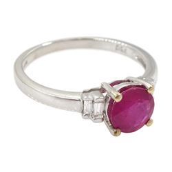 18ct white gold round cut ruby ring, with two baguette cut diamonds set either side, stamped 750, ruby approx 0.80 carat