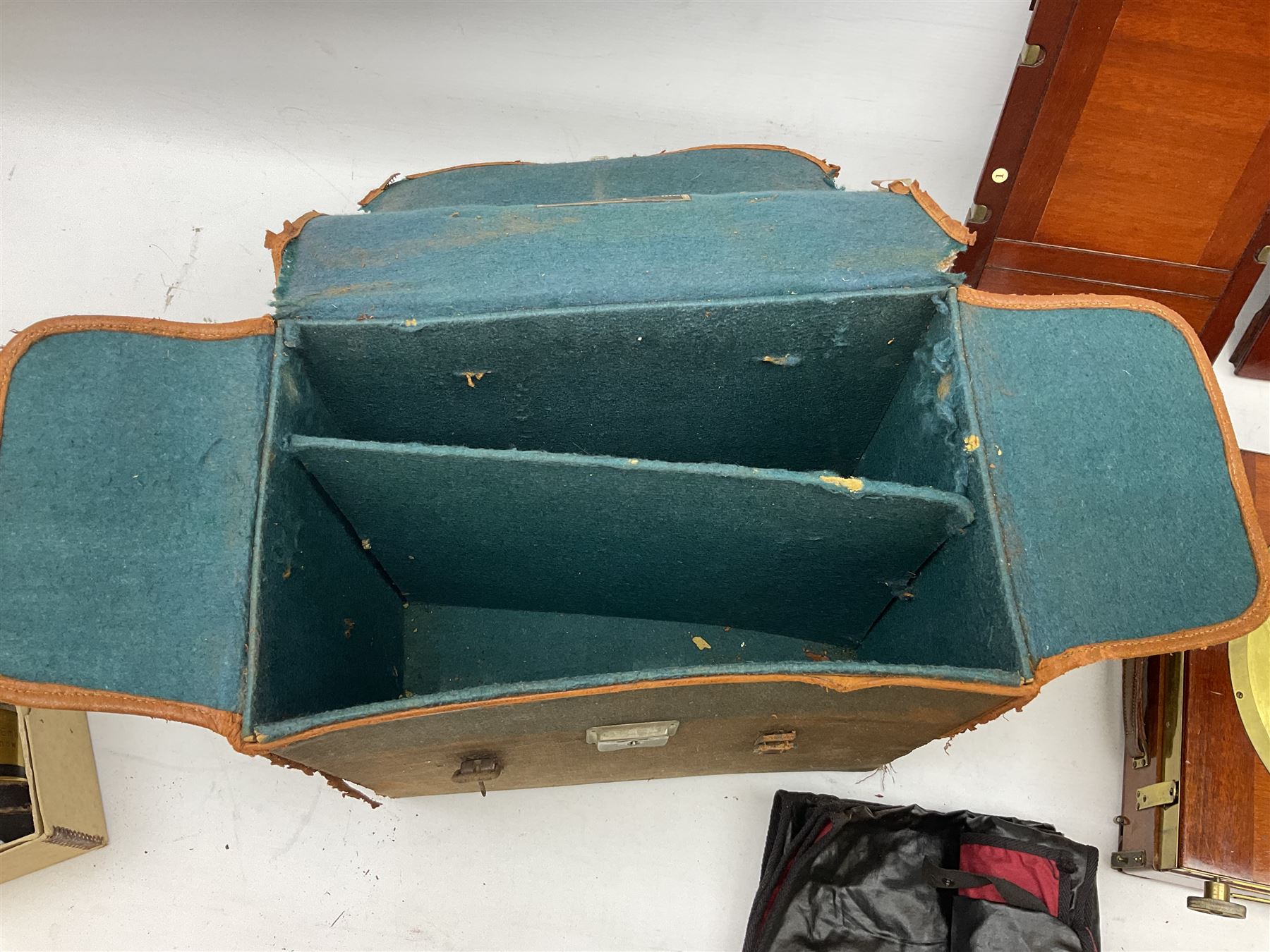 Thornton Pickard folding plate camera in mahogany and lacquered brass, no.529946 and no.529947, field model with canvas wrapped box, three mahogany photographic plates, 'Busch's Portrait Aplanat No4 Foc.14inc' lens and a wooden tripod