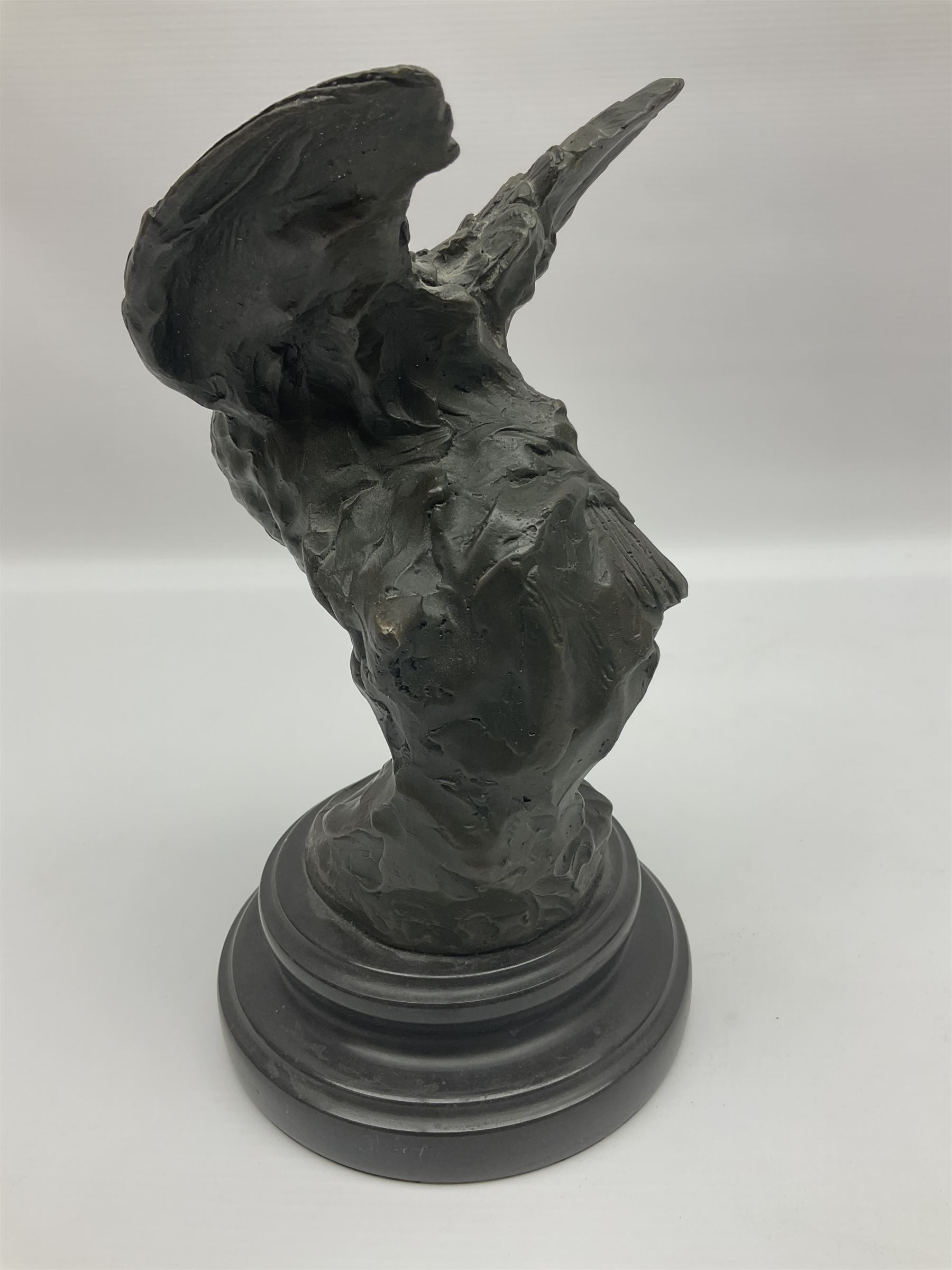 Bronze figure, modelled as an owl upon a rock, on stepped circular base, after Milo, H24.5cm