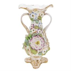 Near pair of Coalbrookdale style vases, of urnular twin handled form, painted with landscape scene and encrusted with blossoming flowers, tallest H29.5cm, together with a smaller Coalbrookdale style twin handled vase profusely encrusted with blossoming flowers, H22cm