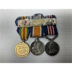George V Military Medal and Distinguished Conduct Medal miniature group of seven medals comprising MM, DCM, WW1 trio including 1914 Star with date clasp and MID leaves, The Great Durbar Delhi 1911 Medal and LSGC; on pinned wearing bar; WW1 Military Medal miniature group of three comprising MM, BWM and Victory; Victoria North West Canada 1885 miniature; and George VI miniature Territorial Efficiency medal; all with ribbons