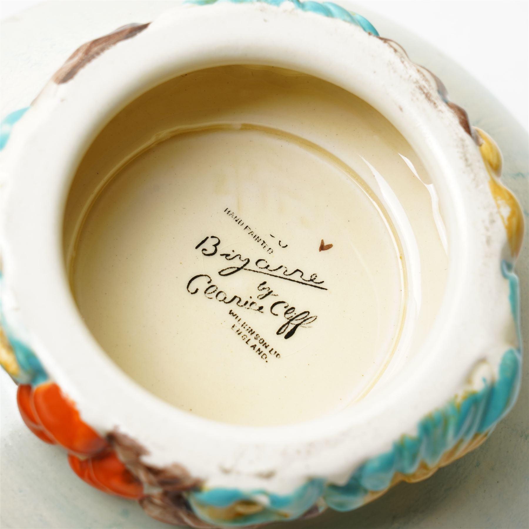 Clarice Cliff drip ware bowl, the pedestal with moulded flowers, bizarre mark to base, H8cm