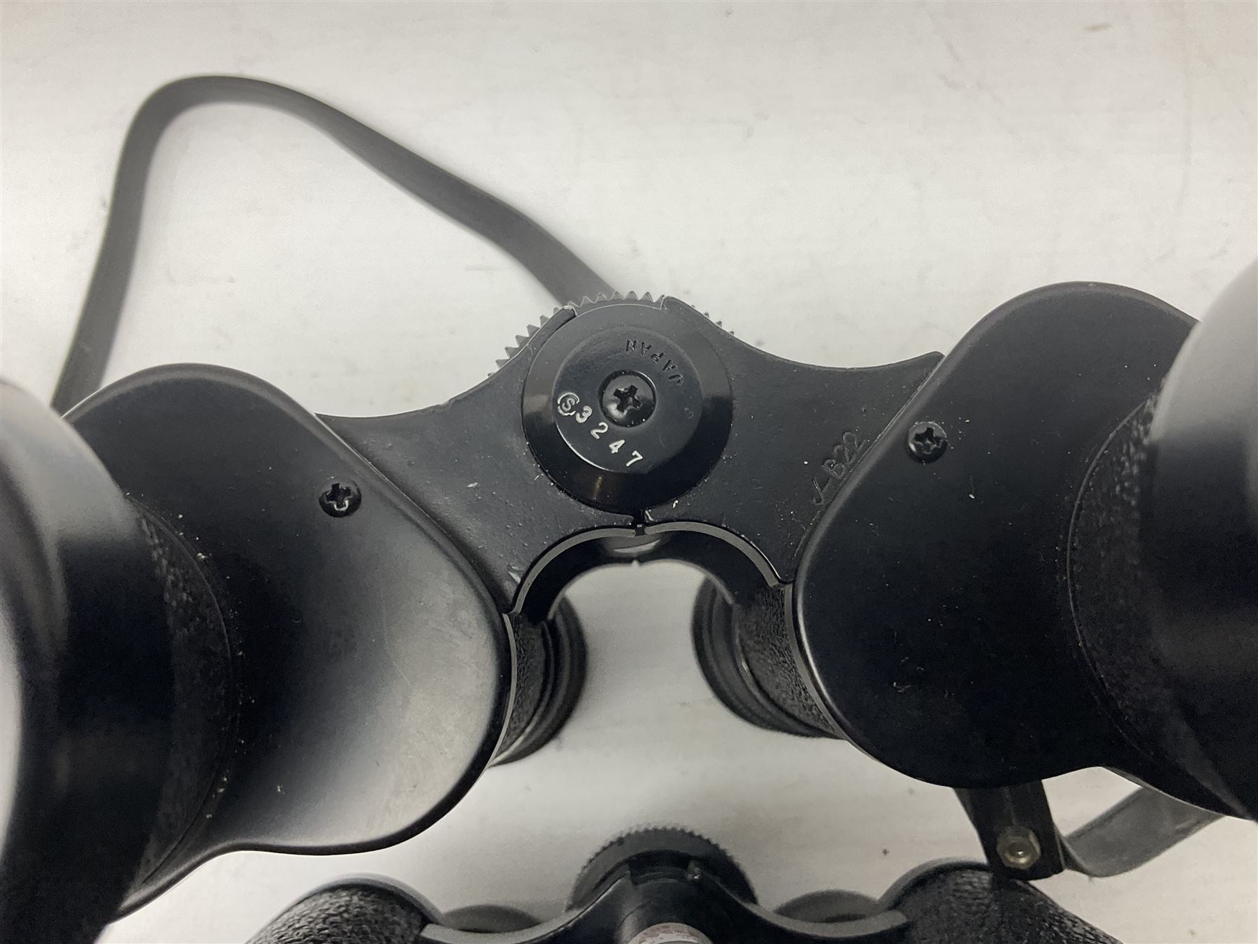 Eleven pairs of binoculars to include Lieberman & Gortz 20x65, Stem (USSR) 7x50, Helios 10x50 Field, Prinz 12x50, Tasco 8x40, Tasco 10x50, etc