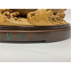 Large Chinese wood carving, depicting the eight immortals crossing the sea, H46cm, L78cm 