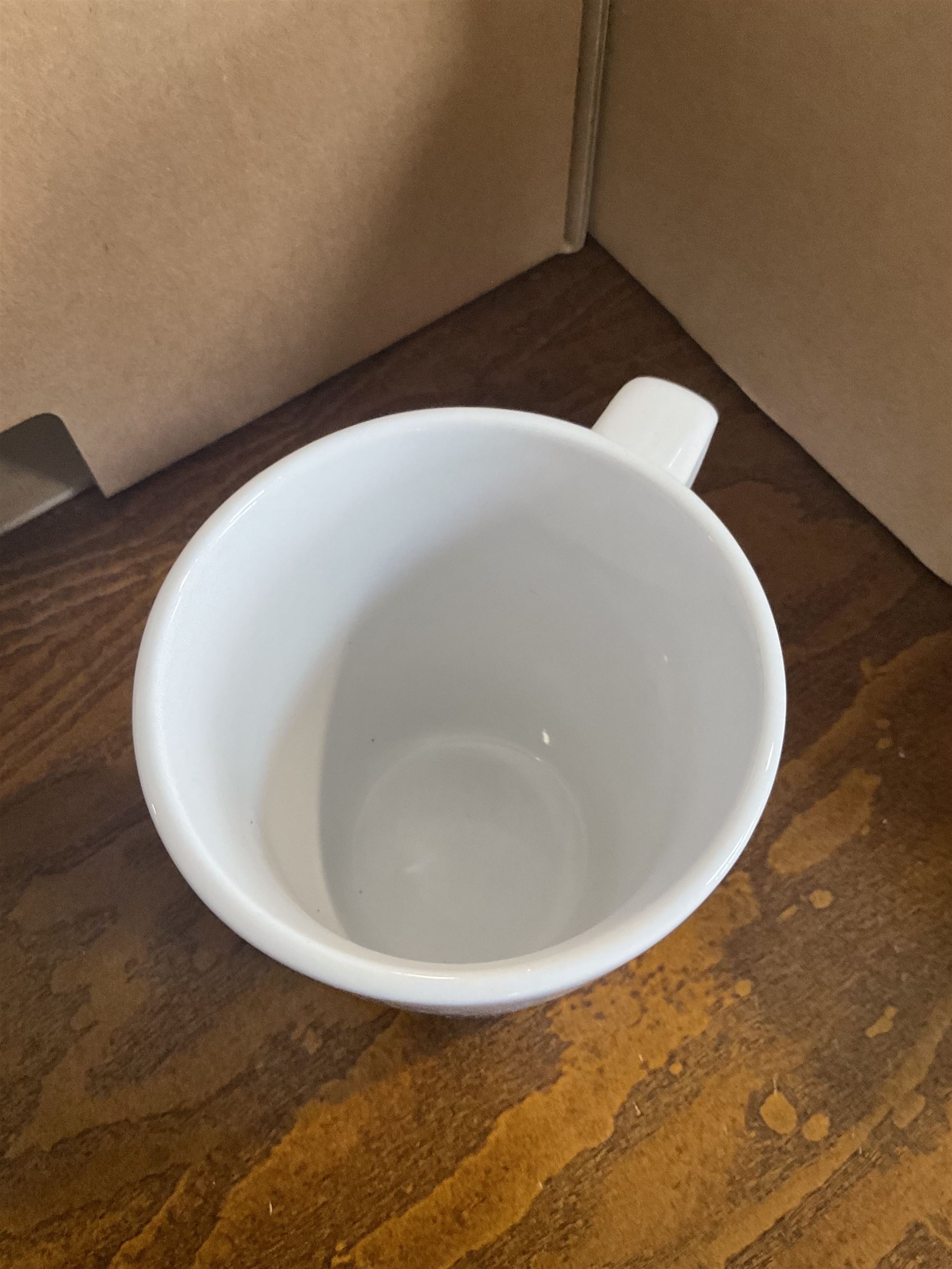 White ceramic coffee mugs approx. (67)- LOT SUBJECT TO VAT ON THE HAMMER PRICE - To be collected by appointment from The Ambassador Hotel, 36-38 Esplanade, Scarborough YO11 2AY. ALL GOODS MUST BE REMOVED BY WEDNESDAY 15TH JUNE.