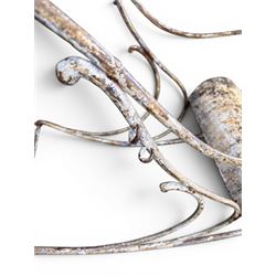 Pair of large unusual 19th century wrought iron garden rocking chairs, simple scroll design, lacking canvas seat