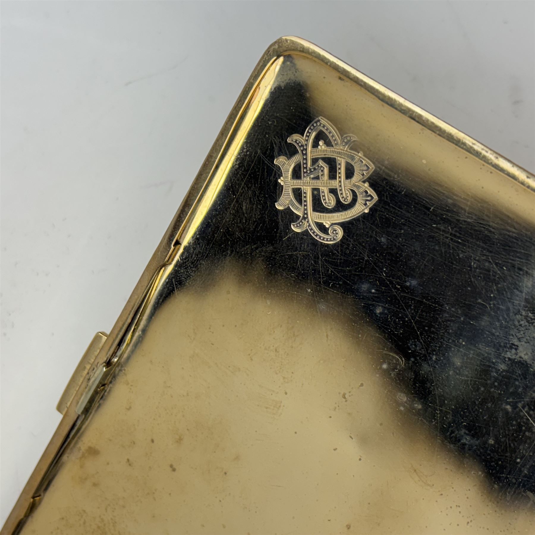 Early 20th century 9ct gold cigarette case, of rectangular form with vertical engine turned decoration, hallmarked Charles S Green & Co Ltd, Birmingham 1935, also marked 9 375, H14cm W8.5cm

