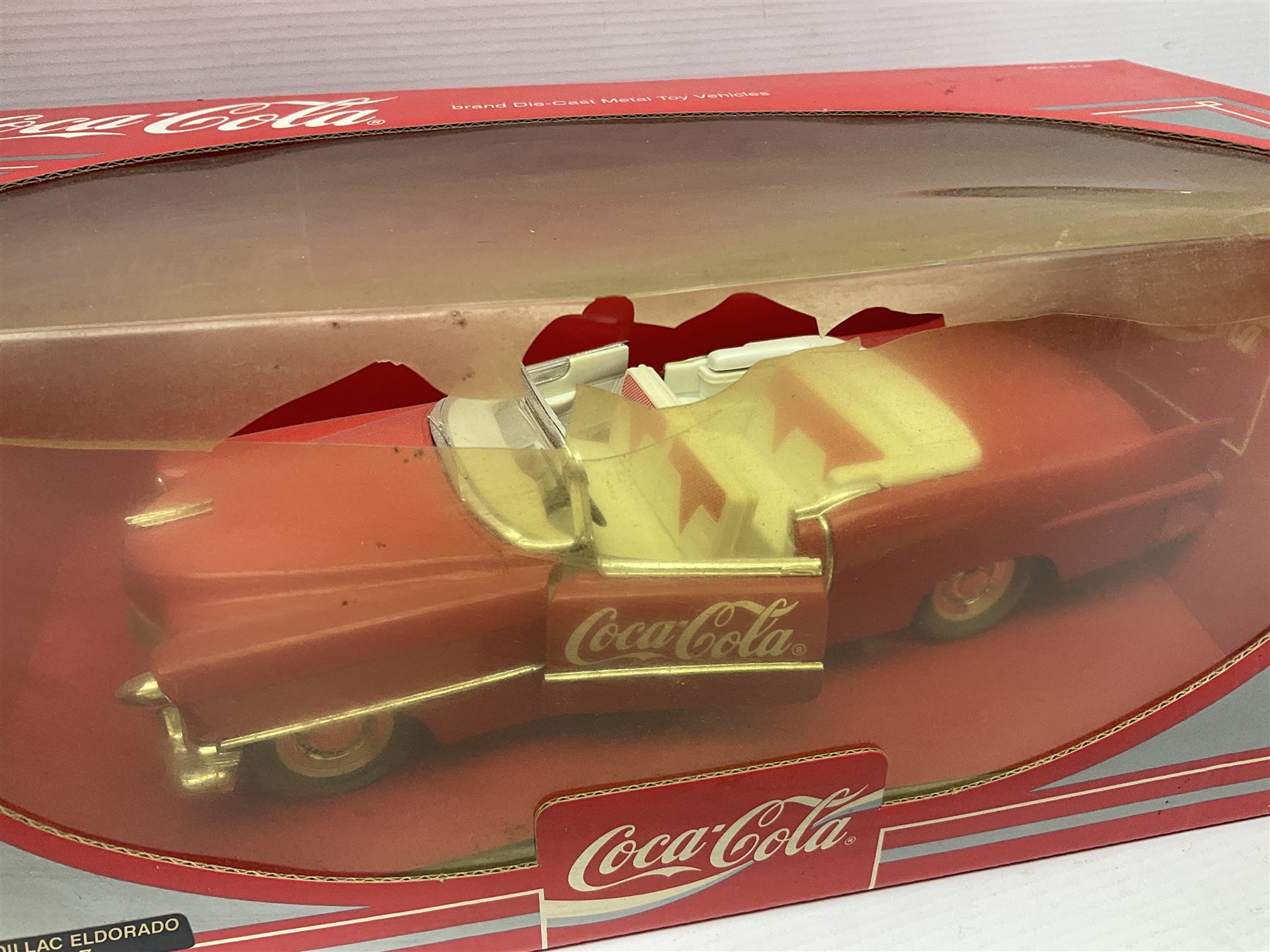 Seven 1:18 scale die-cast models by Ertl, Road legends, Maisto, Solido etc including two Coca Cola promotional vehicles; five boxed (7)