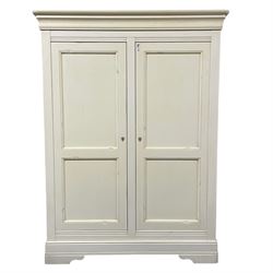 Cream finish double wardrobe, enclosed by two panelled doors, the interior fitted with shelves and hanging rail 