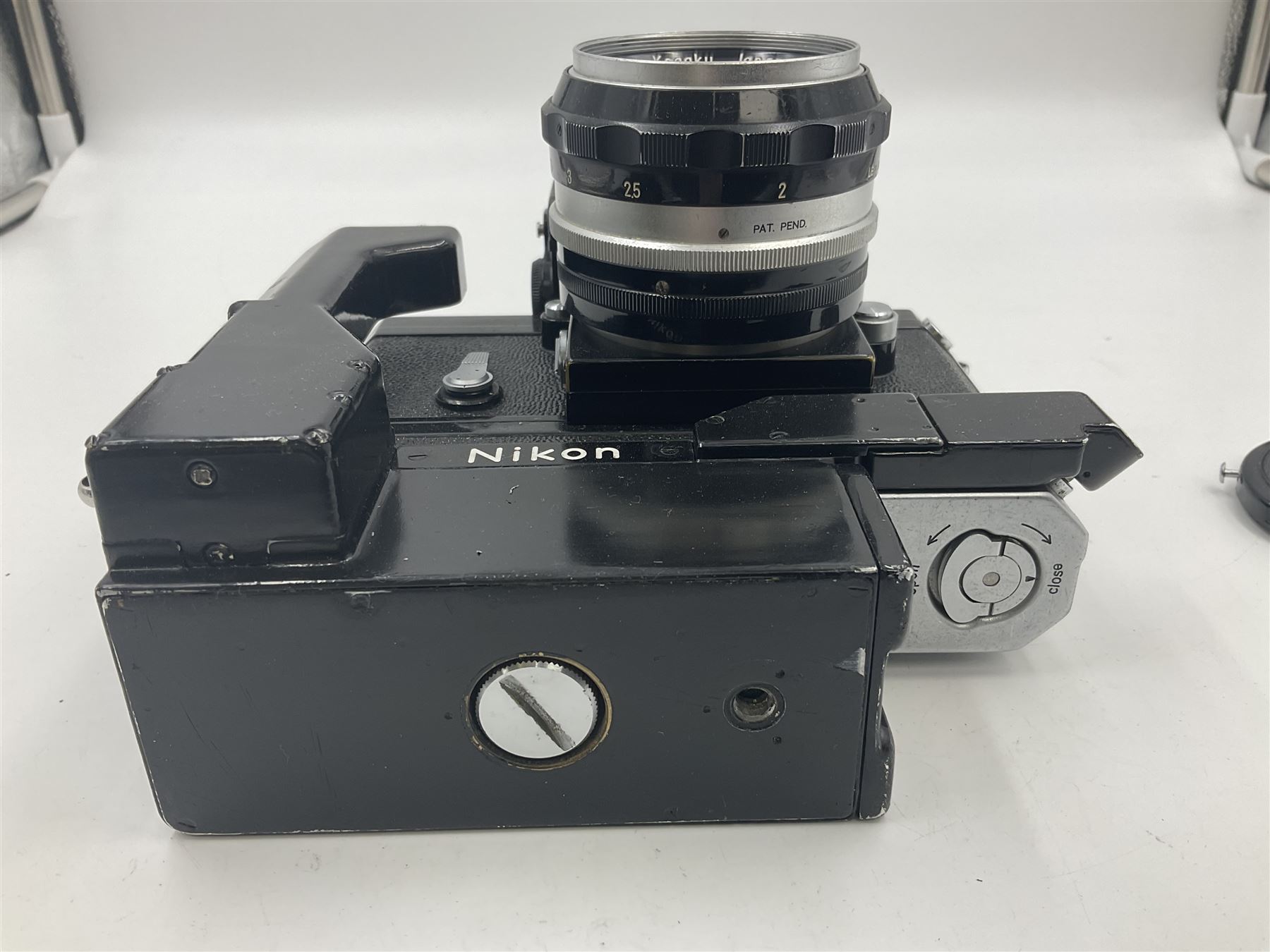 Nikon Photomic TN NKJ camera body, serial no 6728309, circa 1965, with 'Nippon Kogaku NIKKOR-S Auto 1:1.4 f=5.8cm' lens, serial no. 173909, Nikon F36 Motor Drive, serial no.132430 and Nikon cordless battery pack