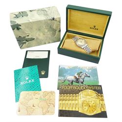Rolex Oyster Perpetual Datejust gentleman's stainless steel automatic wristwatch, circa 1990, Ref. 16220, serial No. E271806, cream dial with Roman numeral hour markers, on Jubilee stainless steel bracelet with fold-over clasp, boxed with papers