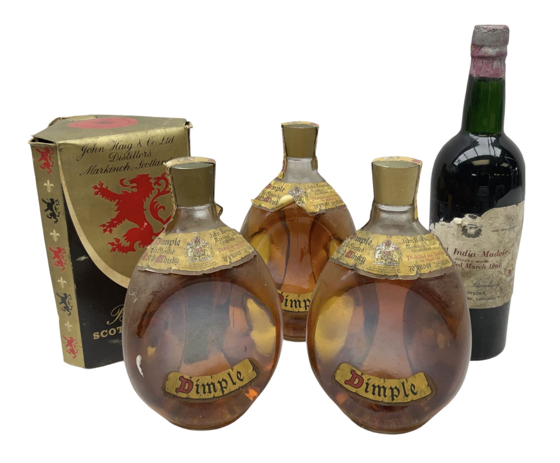 Four bottles of Haig's Dimple Old Blended Scotch whisky, all 26 2/3 Fl.OZs, 70 proof, one in original box and a bottle of East India 1961, Madeira, unknown contents and proof