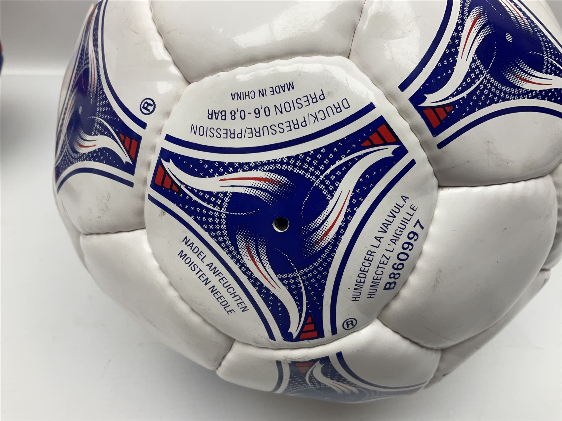 England Rugby official replica ball by Gilbert signed by Mike Tindall, together with a FIFA football