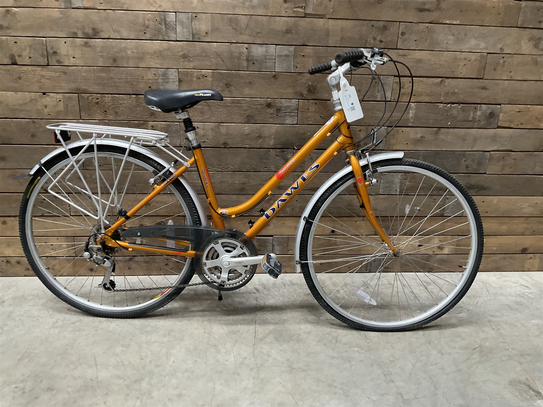 Three bicycles- man’s Falcon Storm 18 speed mountain bike; lady’s Dawes Sonoran 24 speed road bike; child’s Apollo 18 speed bike (3)