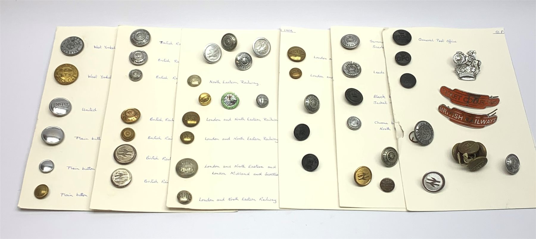 BR North Eastern Ticket Collectors totem cap badge and a similar British Railway badge, both by J.R.Gaunt, a North East Railway enamel pin badge British Railways cap badge, and a collection of Railway, Police and Bus Co. buttons, etc