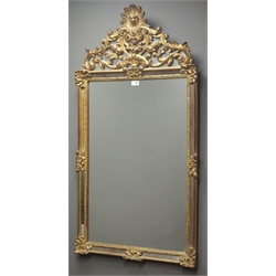  Gilt framed mirror, pierced shell and scroll cresting W68cm, H126cm, D6cm  