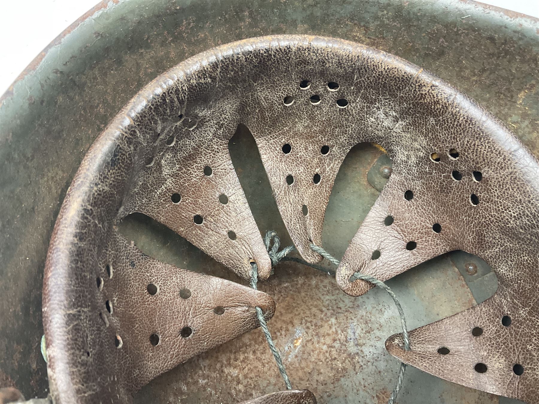 WWII Italian steel helmet with liner and chin strap