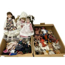 Three porcelain headed dolls, with inset glass dressed in traditional clothing with lace detail and wigs, and Collection of Native American sleep eye dolls to include approximately five Carlson examples, in traditional leather, beaded and fur dress, etc