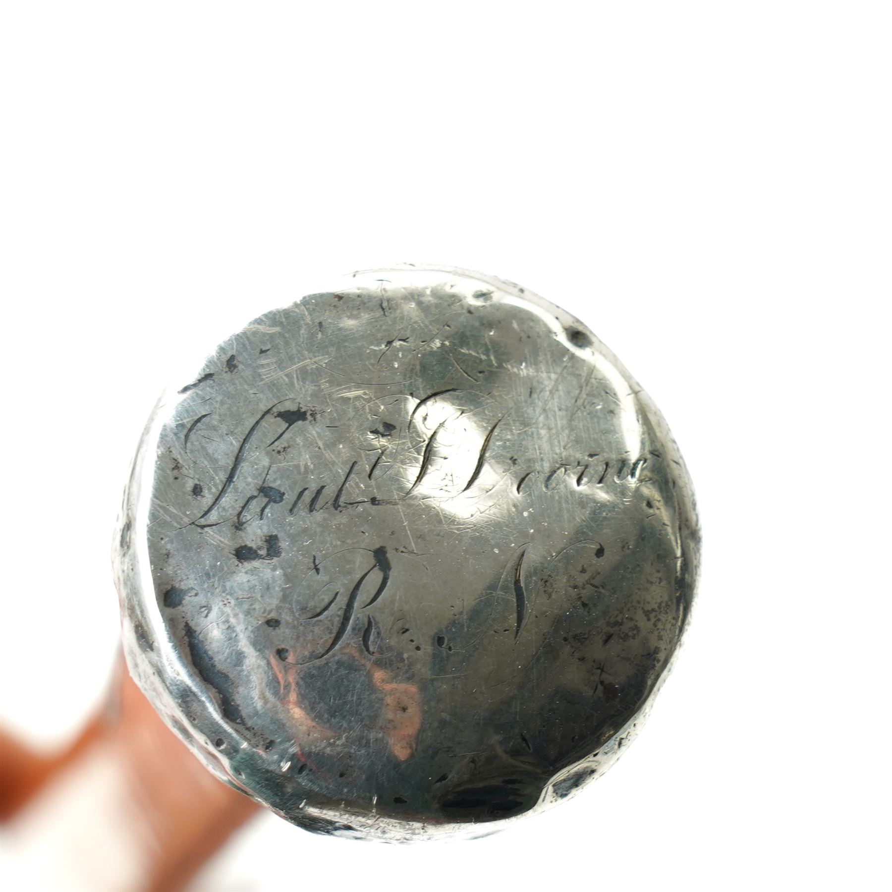 Malacca cane with silver top and the crest of Royal West Kent Regt and one other 19th century silver topped Malacca cane inscribed 'Lt. Doorne R.N.' (2)