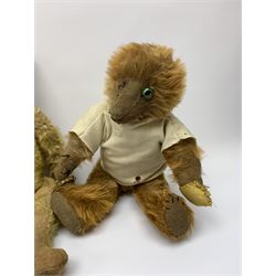 Early 20th century cinnamon coloured bear c1920, possibly continental, with unusual hedgehog styled head/face, swivel jointed head, wood wool filled body with jointed limbs, five claw stitches to feet  and inoperative growler mechanism H16