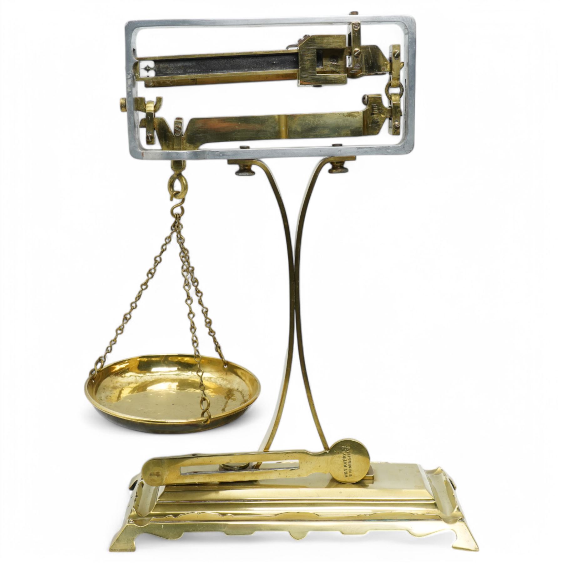Set of brass balance scales on platform base 