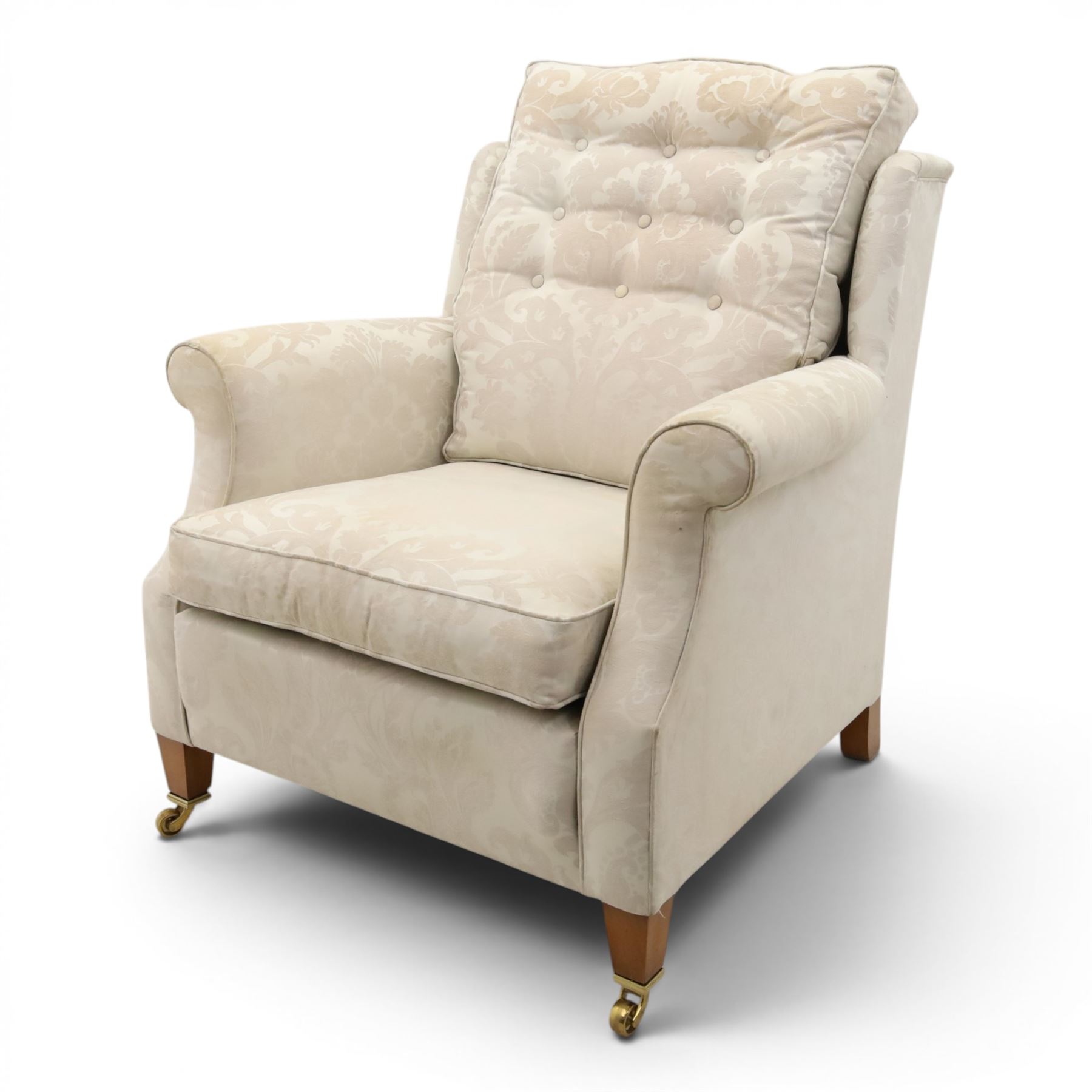 Duresta England - armchair upholstered in beige damask fabric, with deep seat and button back, loose seat cushions with scrolled arms, raised on brass castors