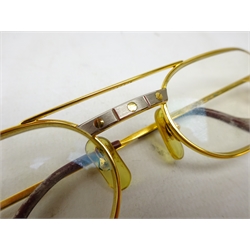  Cartier: Must Santos 18k gold plated glasses, size 55-20, with certificate and guarantee in red leather case with outer case    