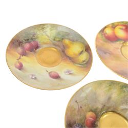 Two small 20th century Royal Worcester cabinet cups and saucers, together with another saucer, each painted with a still life of fruit upon a mossy ground, bearing various signatures: E Townsend, Ricketts, G H Cole, and H Ayrton, each with puce printed mark beneath, teacups approximately H3cm D5.5cm, coffee cup H4.5cm, saucers 9.5.cm