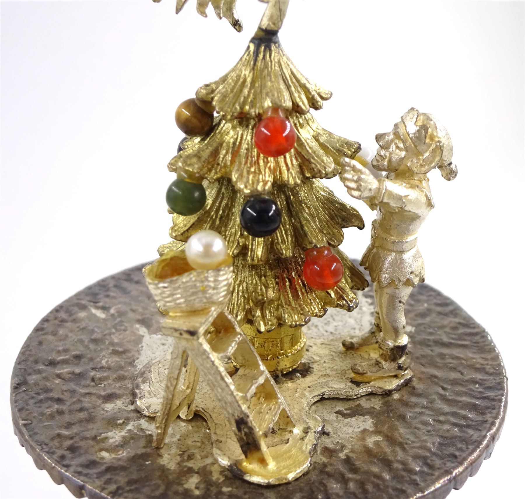 Christopher Nigel Lawrence limited edition silver and parcel gilt surprise mushroom, the textured domed cover opening to reveal two elves decorating a semi-precious gem set Christmas tree, upon a slate base, no 100/250, hallmarked Christopher Nigel Lawrence, London 1980, overall H9cm