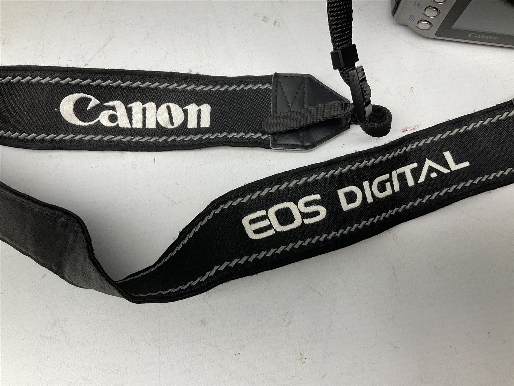 Canon EOS 300D Digital SLR in silver, with Canon 'Zoom Lens EF-S18-55mm 1:3.5-5.6', with soft shell bag and instruction manual