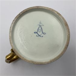 Sèvres soft paste porcelain coffee can and saucer with date code for 1767, painted with floral and laurel leaf garlands within blue scalloped and gilt borders, interlaced LL monogram enclosing the date letter O above painters mark for Catrice, coffee can H7.5cm, saucer D15cm