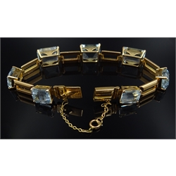  Graduating emerald cut aquamarine 18ct gold link bracelet  
