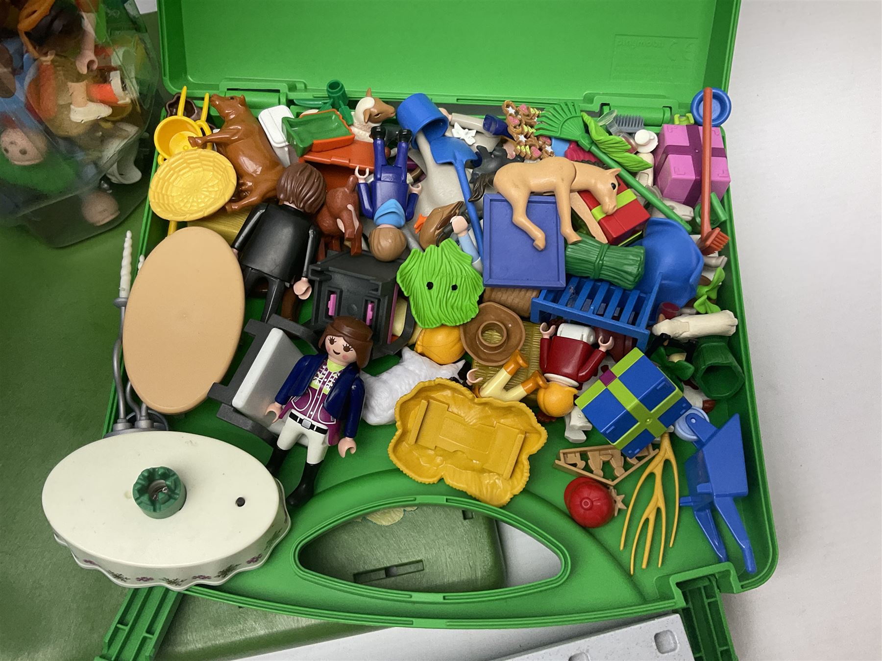 Quantity of loose Playmobil figures, playset parts and accessories, with small amount of Britains Ltd figures etc, in two boxes 
