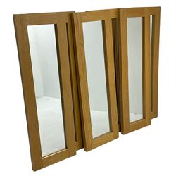 Six oak framed rectangular mirrors