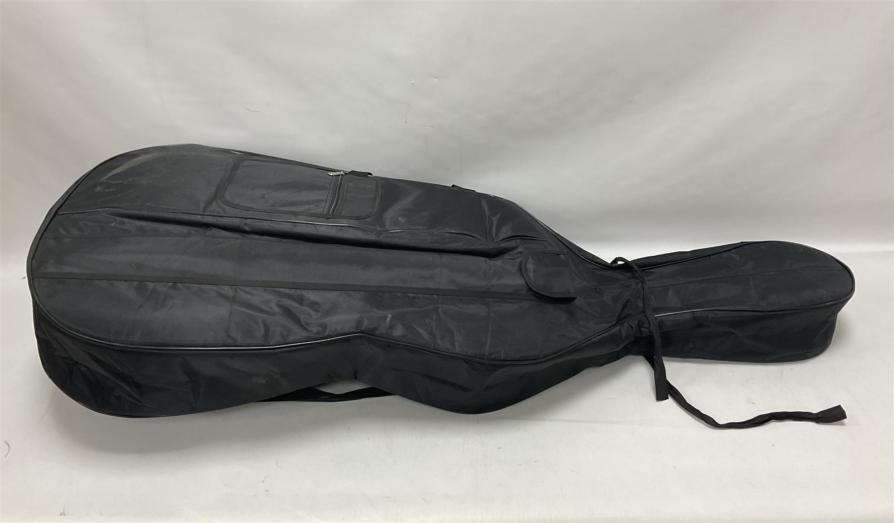3/4 size cello with soft case, 69cm back length, 114cm full length, with bridge, ebonised tail piece and fingerboard.