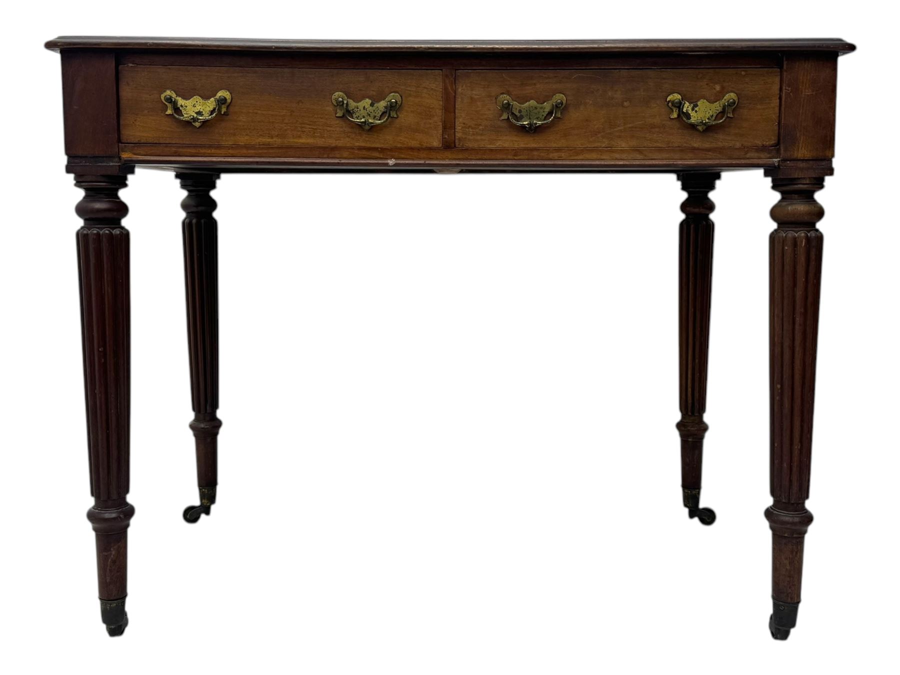 Early 19th century mahogany side table, moulded rectangular top over two drawers, on turned and reeded supports, brass cups and castors 
