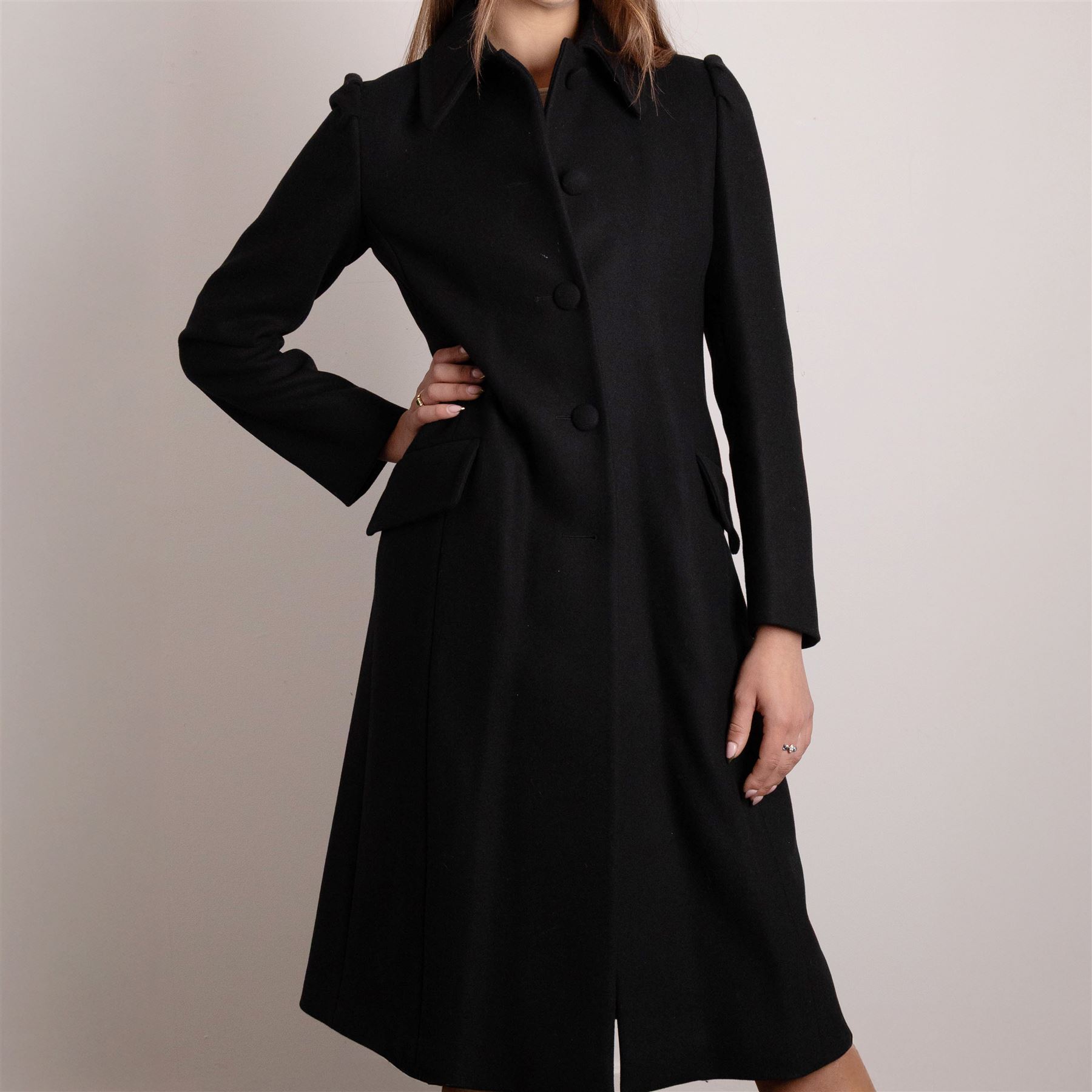 Prada - black Melton wool coat, in a redingote style with front fastening and fabric-covered buttons, flap pockets and a structured collar with slit to the back, size 44, unused with the original garment bag and hanger