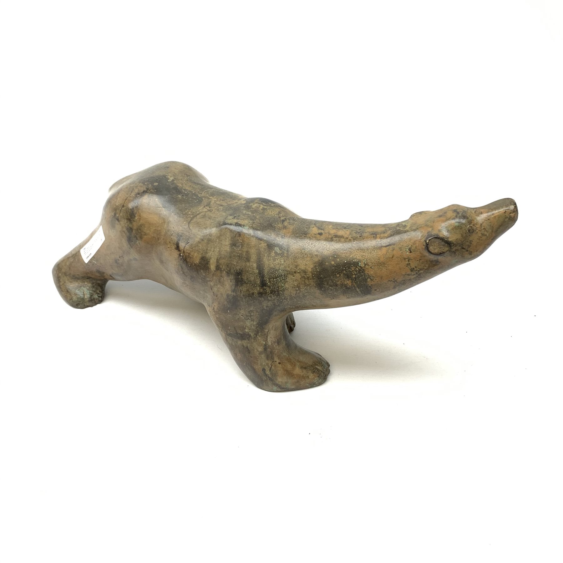 Pierre Chenet (French Contemporary): Polar Bear, bronze ochre patina nuanced with green, impressed signature with Milan Foundry mark, 48cm