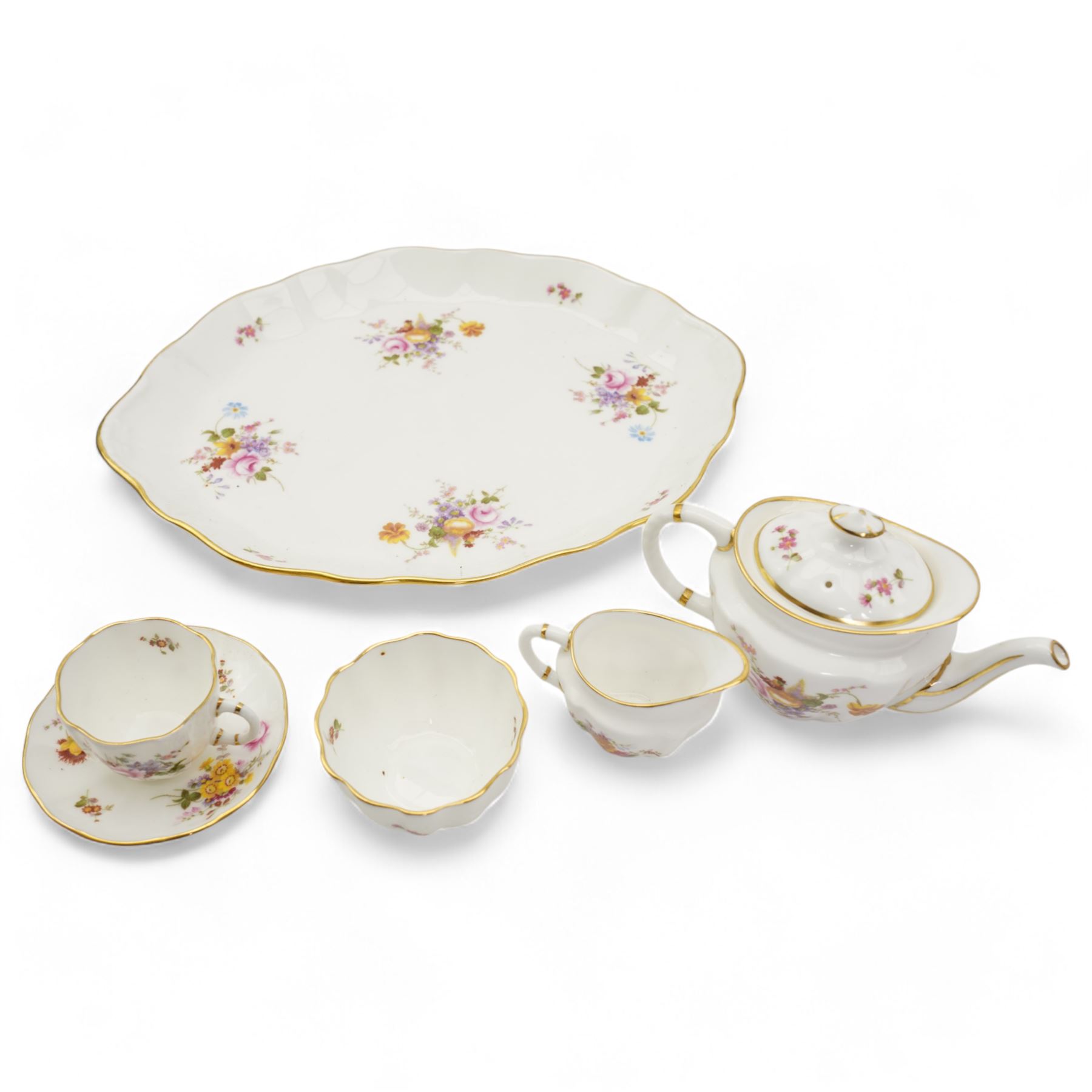 Royal Crown Derby 1128 miniature tea set, Derby Posies miniature tea set, a teacup and saucer, a twin handled mug and Royal Worcester miniature teacup and saucer 