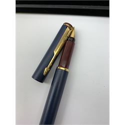 A group of pens, comprising Parker Duofold Centennial pearl and black ballpoint pen, Parker Frontier ballpoint pen, Ronson Penciliter, in original box, Parker Rialto fountain pen, and a further unmarked ballpoint. (5). 
