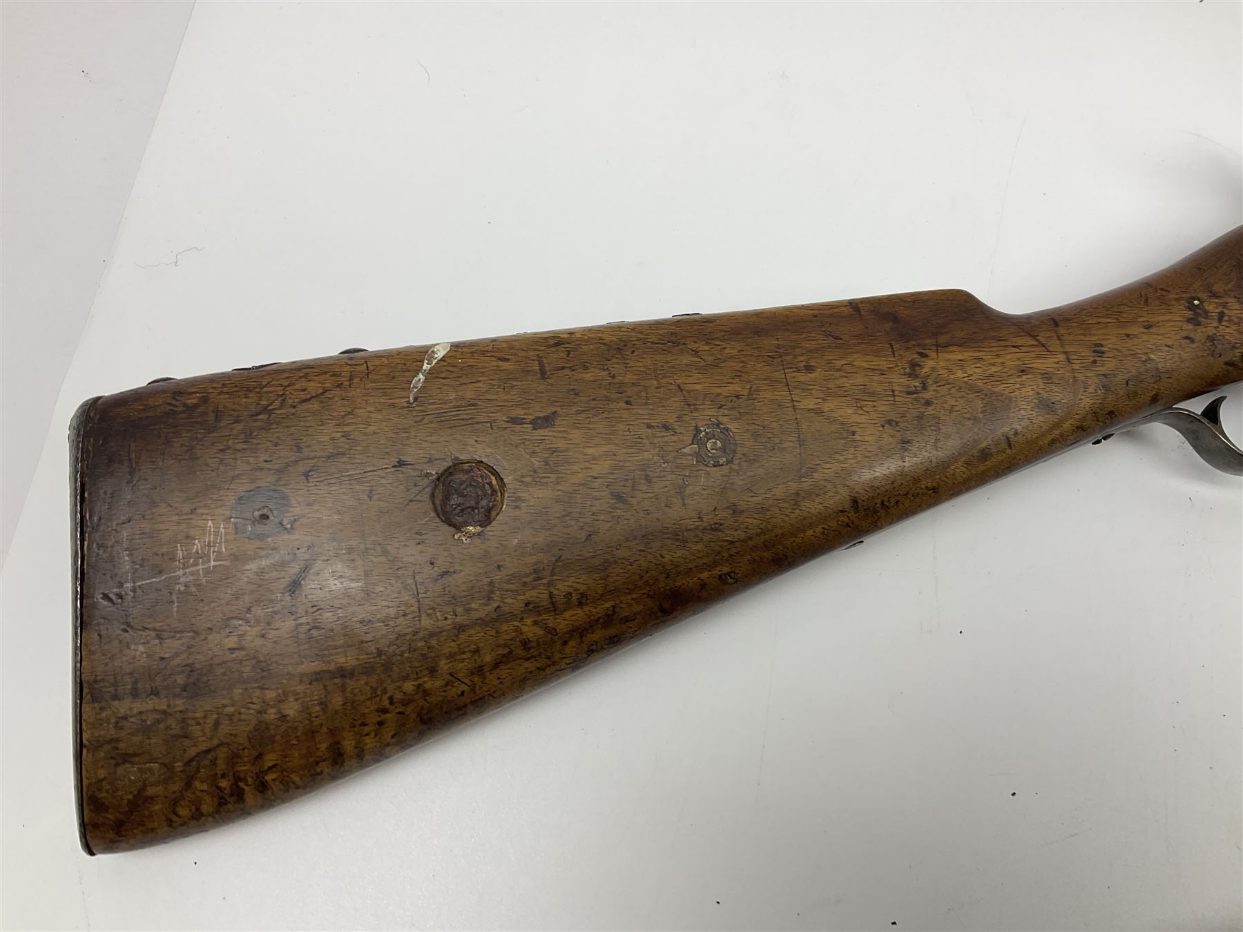 19th century Indian .577 Enfield muzzle loading rifle, proofed for 26-bore, the 98.5cm barrel with three barrel bands and later ram rod L140cm overall; 19th century Belgian side-by-side double barrel percussion shotgun, approximately 20-bore, with 74cm barrels and studded walnut stock, lock plate marked 'Liege 1868' and 'V. Gulikers-Maquinay' L117cm overall; and another side-by-side double barrel shotgun by Smythe with underlever opening (3)