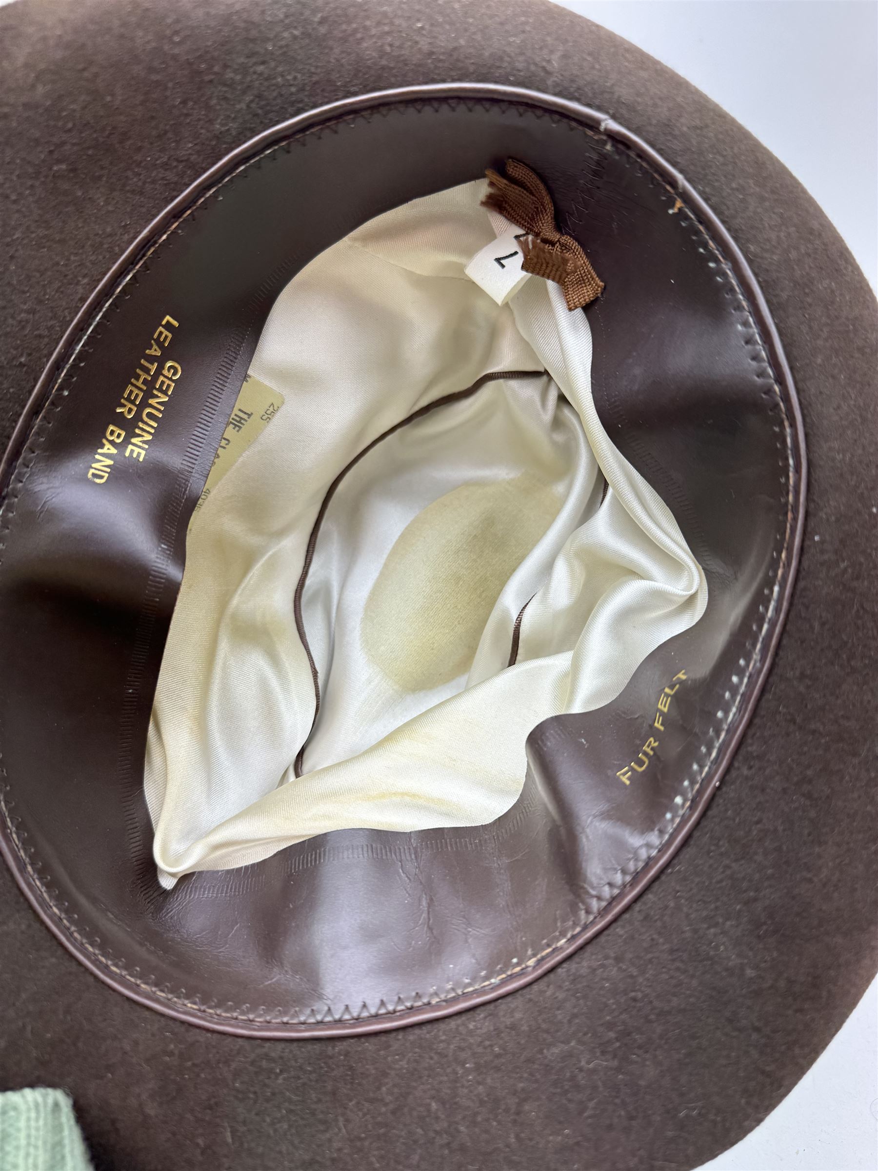 Akubra pure fur felt trilby hat, together with another trilby and two top hats, one by Woodrow and one by Dunn & Co