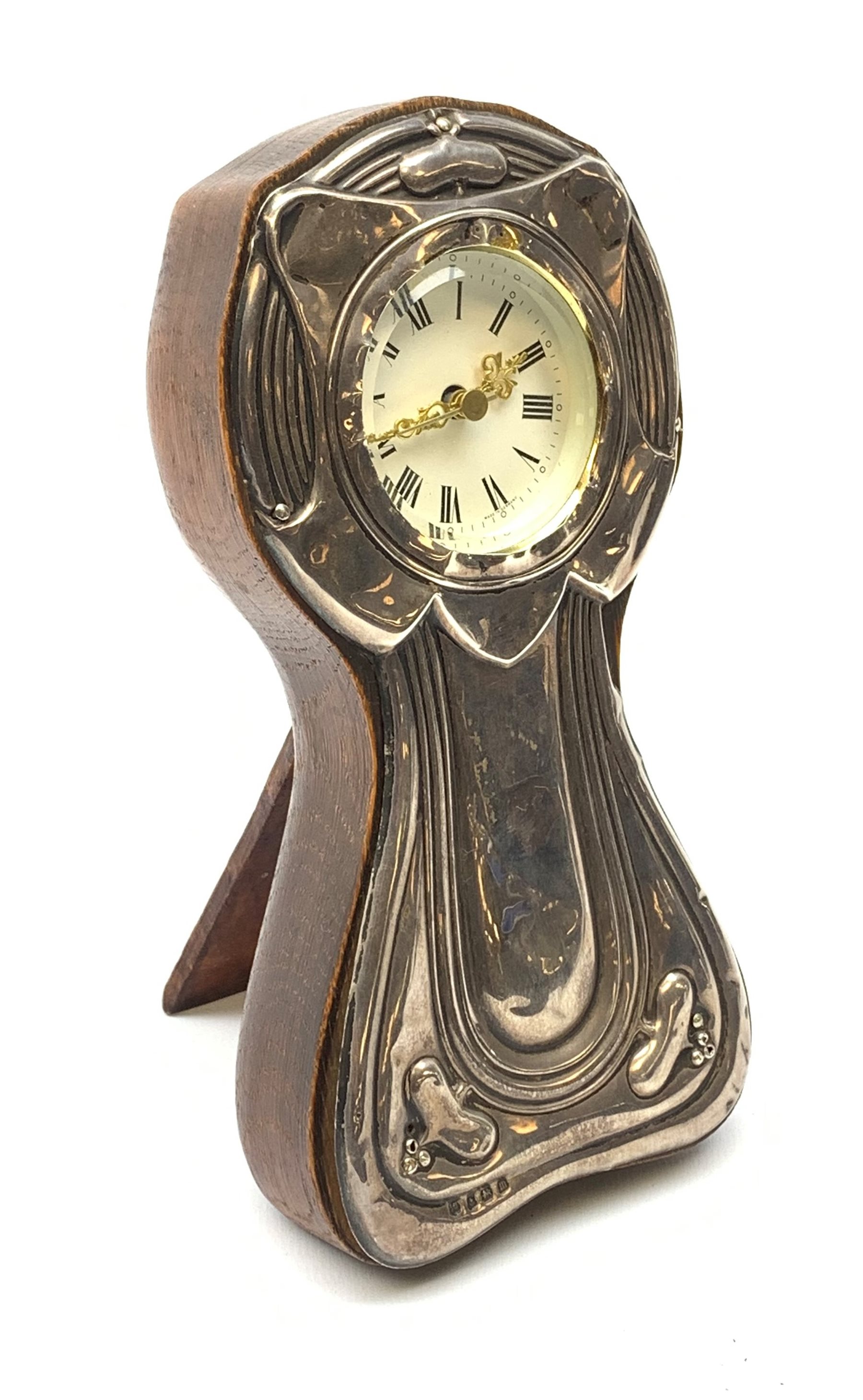 An early 20th century silver mounted oak Art Nouveau clock, hallmarked ...