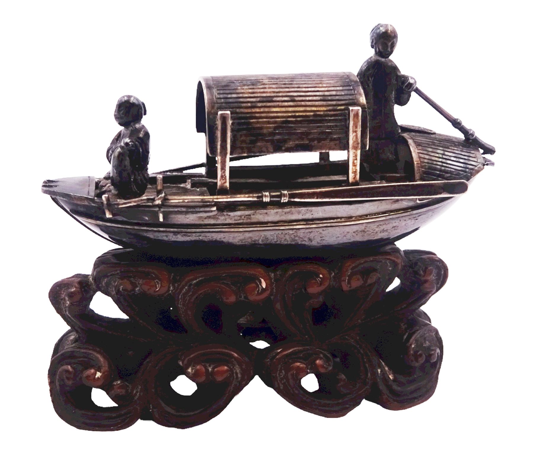 Chinese miniature silver model of a junk, with character mark to stern, mounted upon a carved wooden stand, overall H5cm L6.5cm