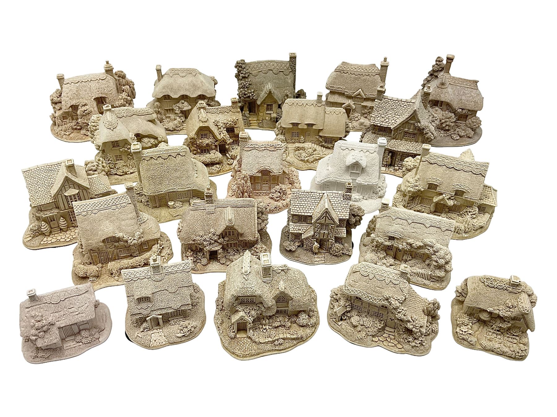 Twenty-three Lilliput Lane models from the Paint Your Own collection, to include Catmint Cottage, Sugar and Spice, Gypsy Cottage, Ruby Cottage and Little Birch, some boxed