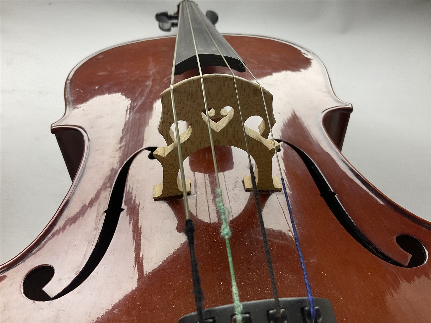 Modern Hungarian half-size cello with 69cm two-piece maple back and ribs and spruce top L114cm overall; and Stentor half size cello bearing label 'The Stentor Student II'; each in soft carrying case (2)