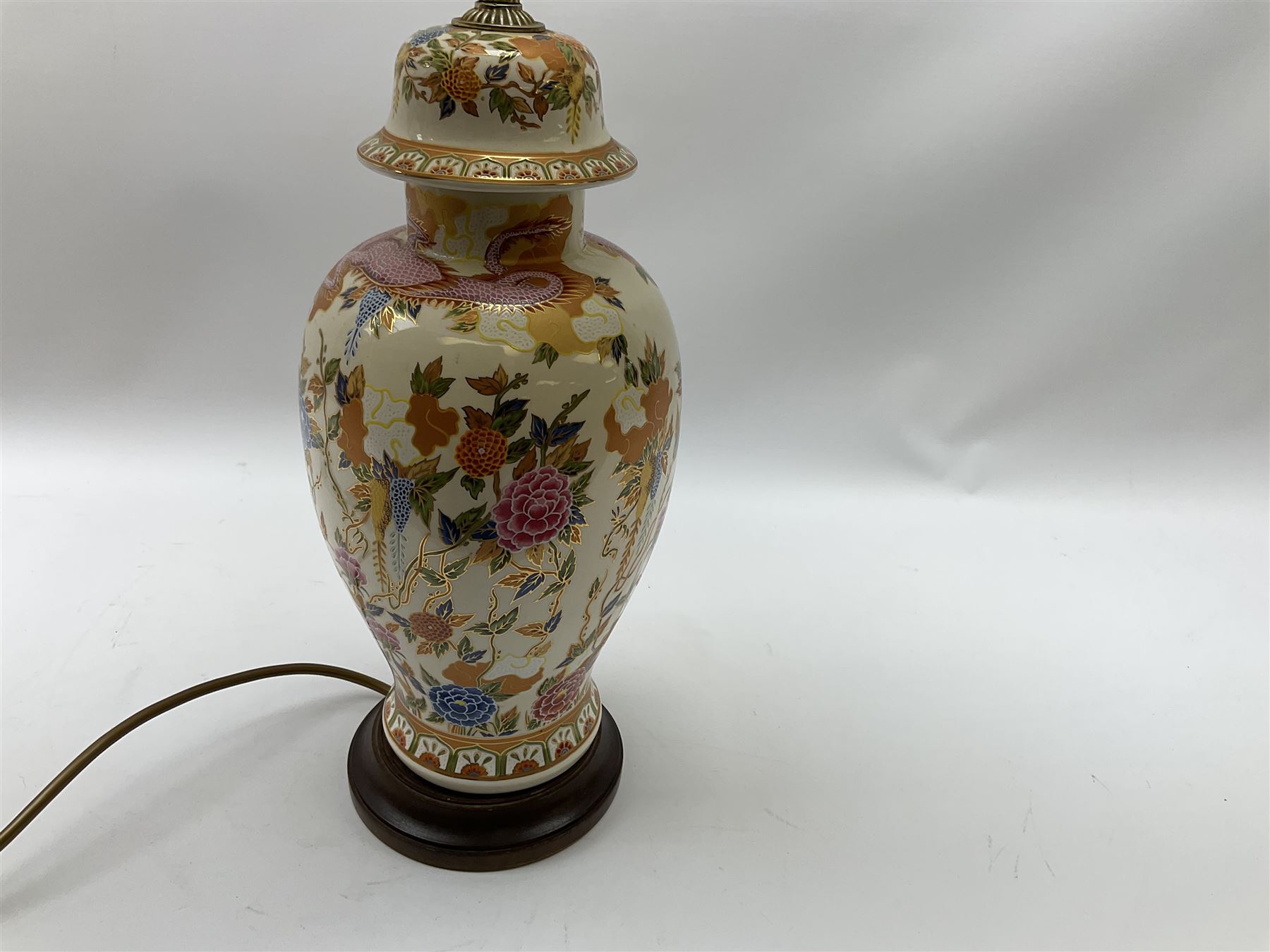 Table lamp of baluster form, decorated in the Oriental style with phoenix and dragon amidst blossoming flowers, with plated cream fabric shade, lamp base not including fixtures H35cm