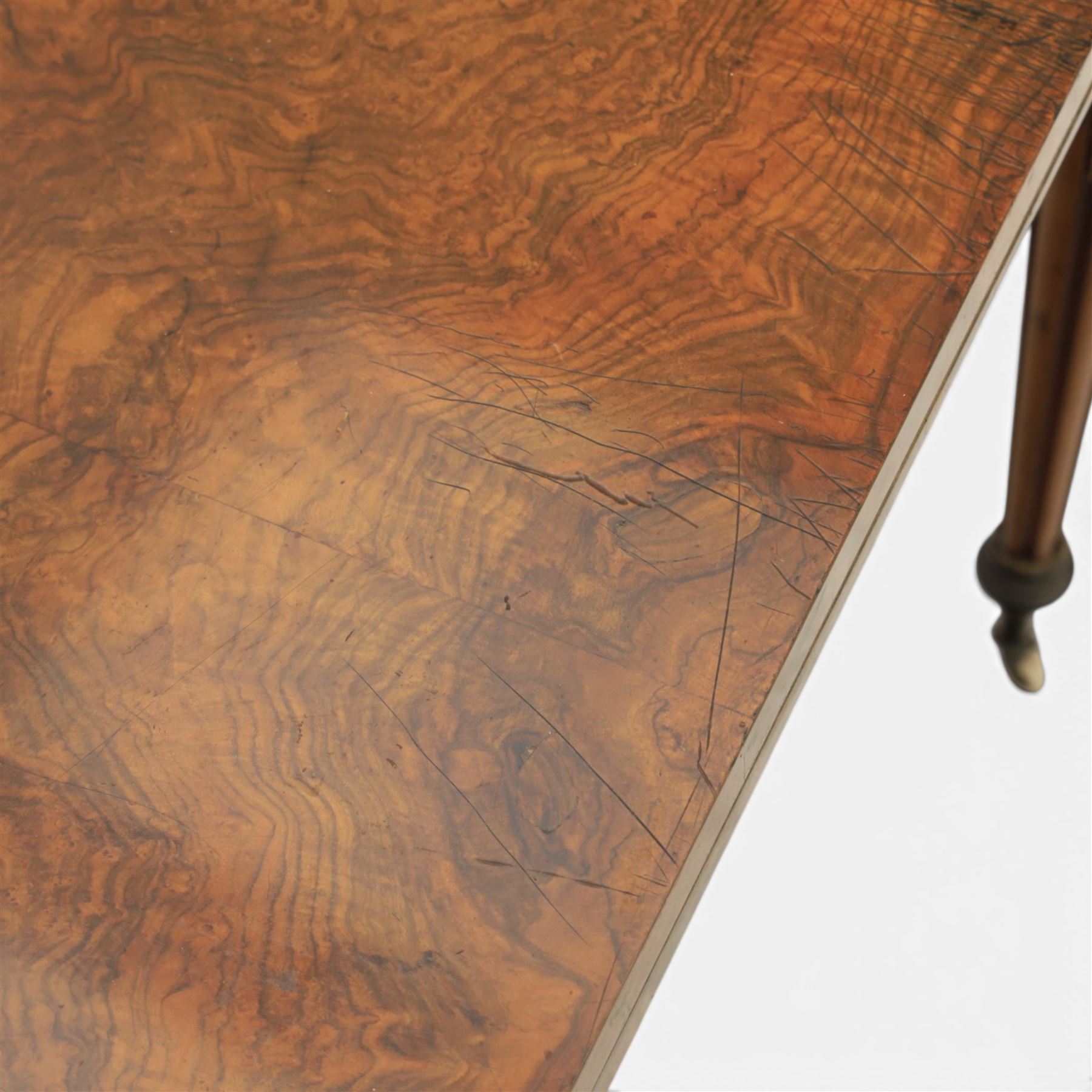 Victorian walnut card table, hinged rectangular moulded top with rounded corners and figured veneers, revealing a green baized lined interior, plain frieze with beaded lower edge, raised on ring turned tapering supports terminating in ceramic castors